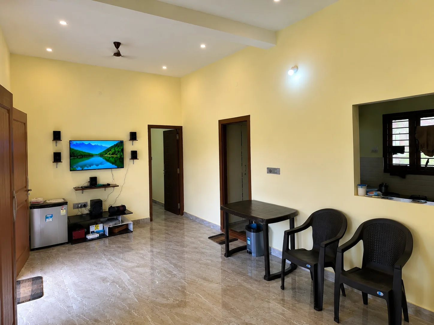 The bright living hall with TV setup